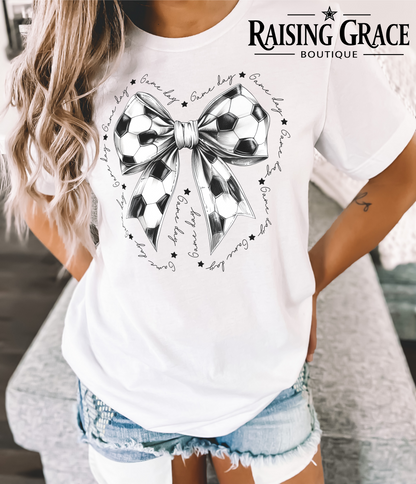 Soccer Bow Graphic T-Shirt | Coquette Soccer Tee | Sports Mom Shirt | Boutique Soccer Graphic Tee | Game Day Bow Shirt